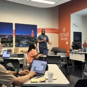 group of faculty working on course prep 